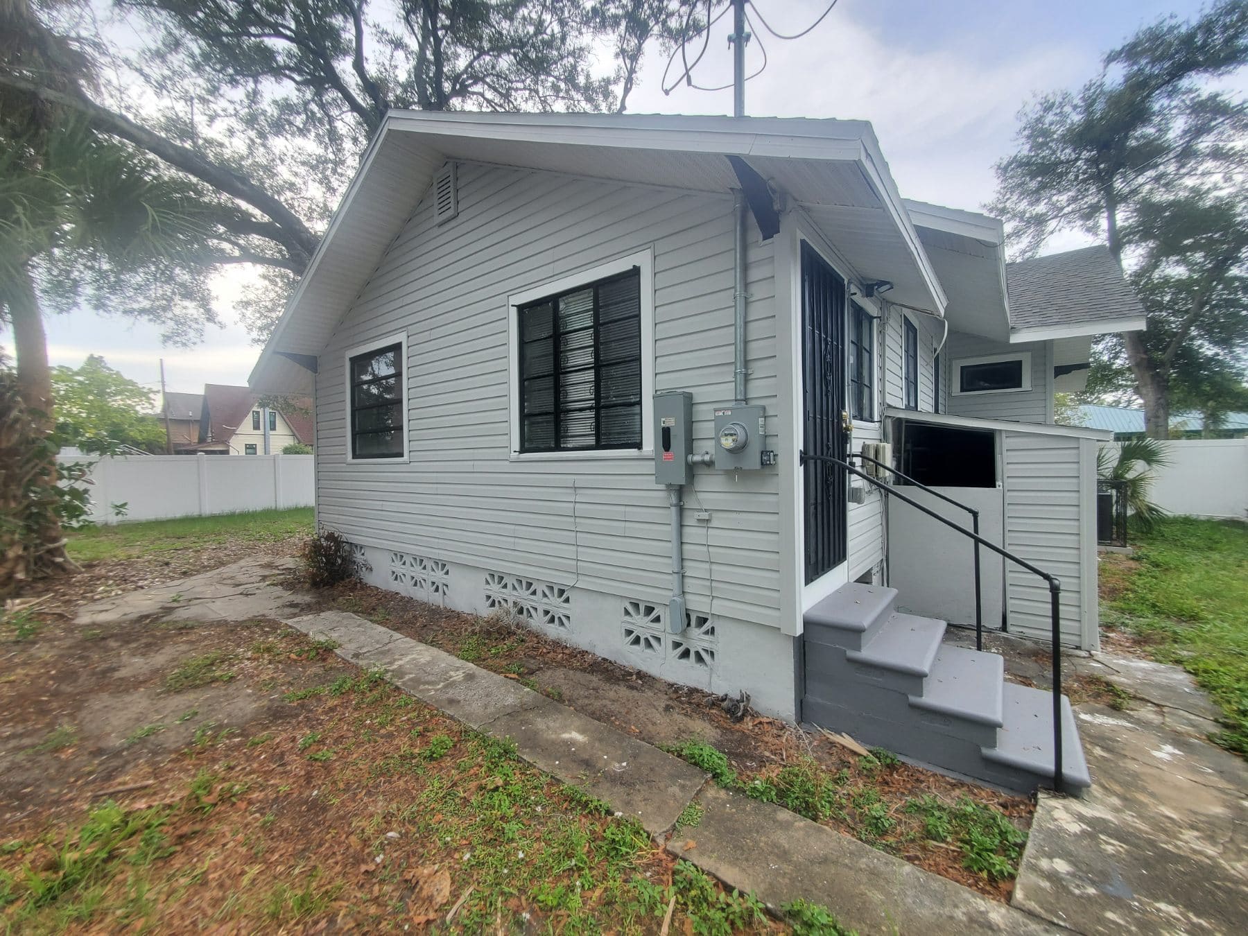 Exterior-Back-Porch-And-Wooden-Stairs-Painting-Grey