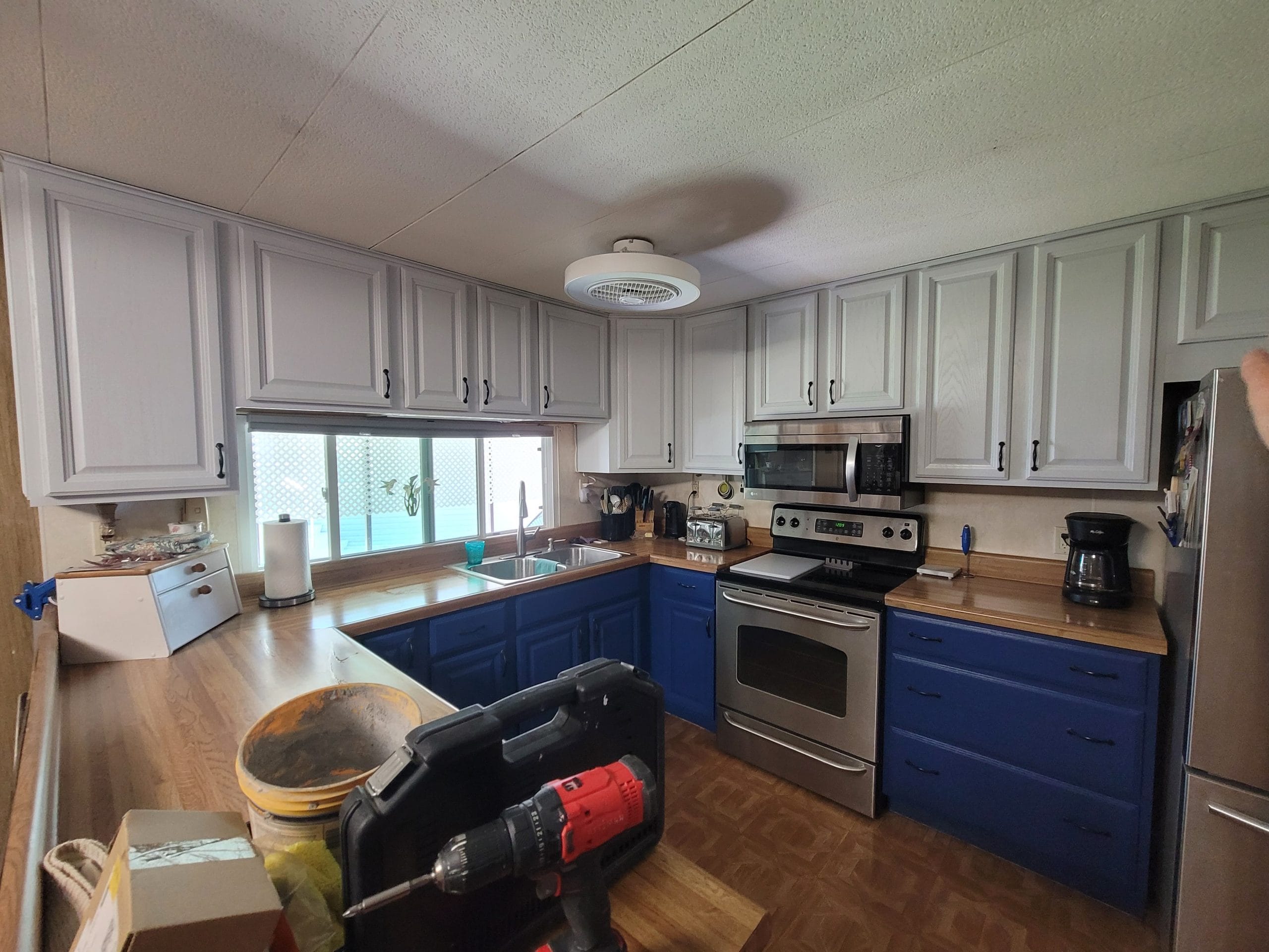 Finished-Two-Tone-Kitchen-Cabinets-Blue-And-White