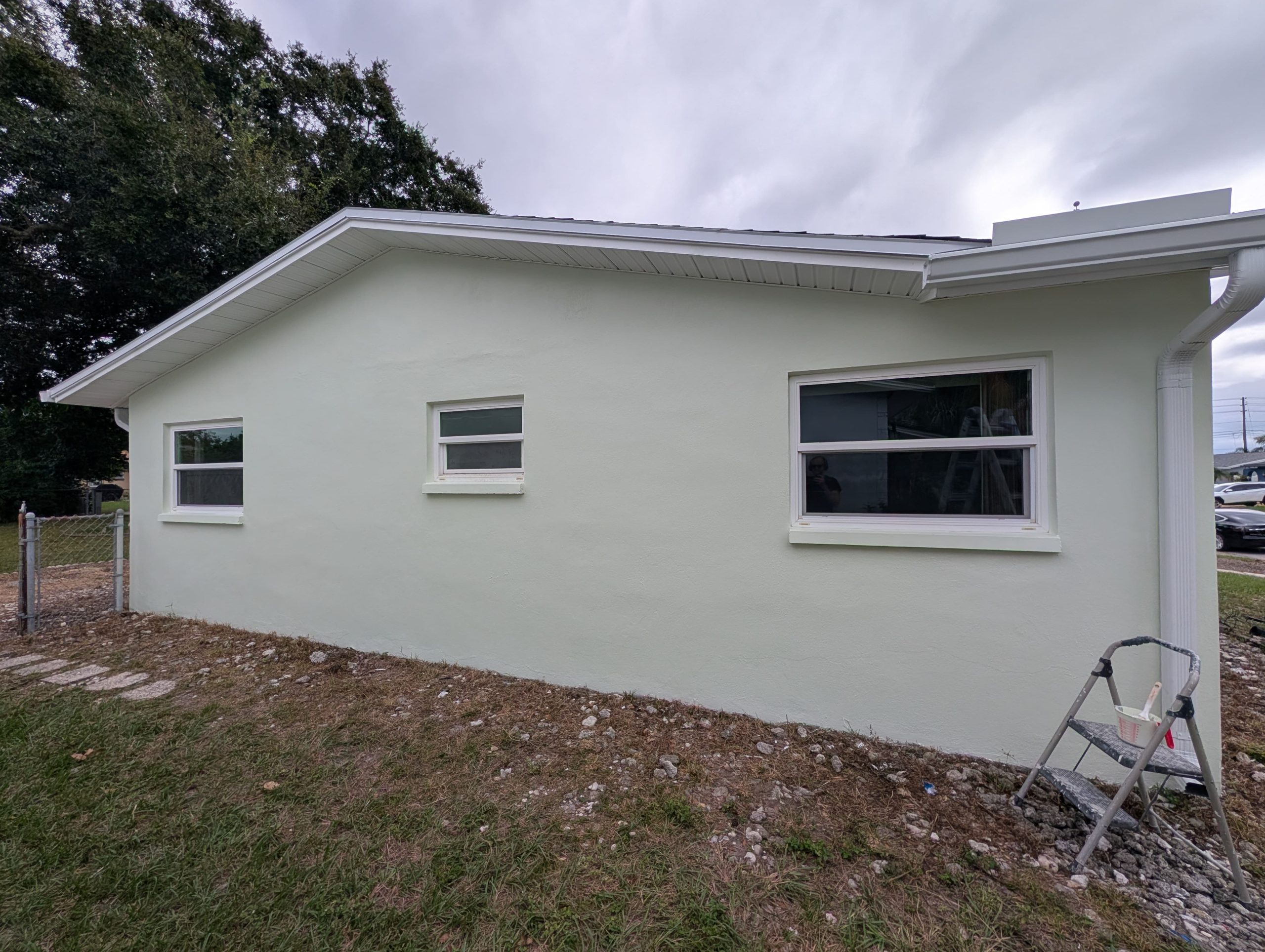 Painting-Around-Exterior-Windows-And-Gutters