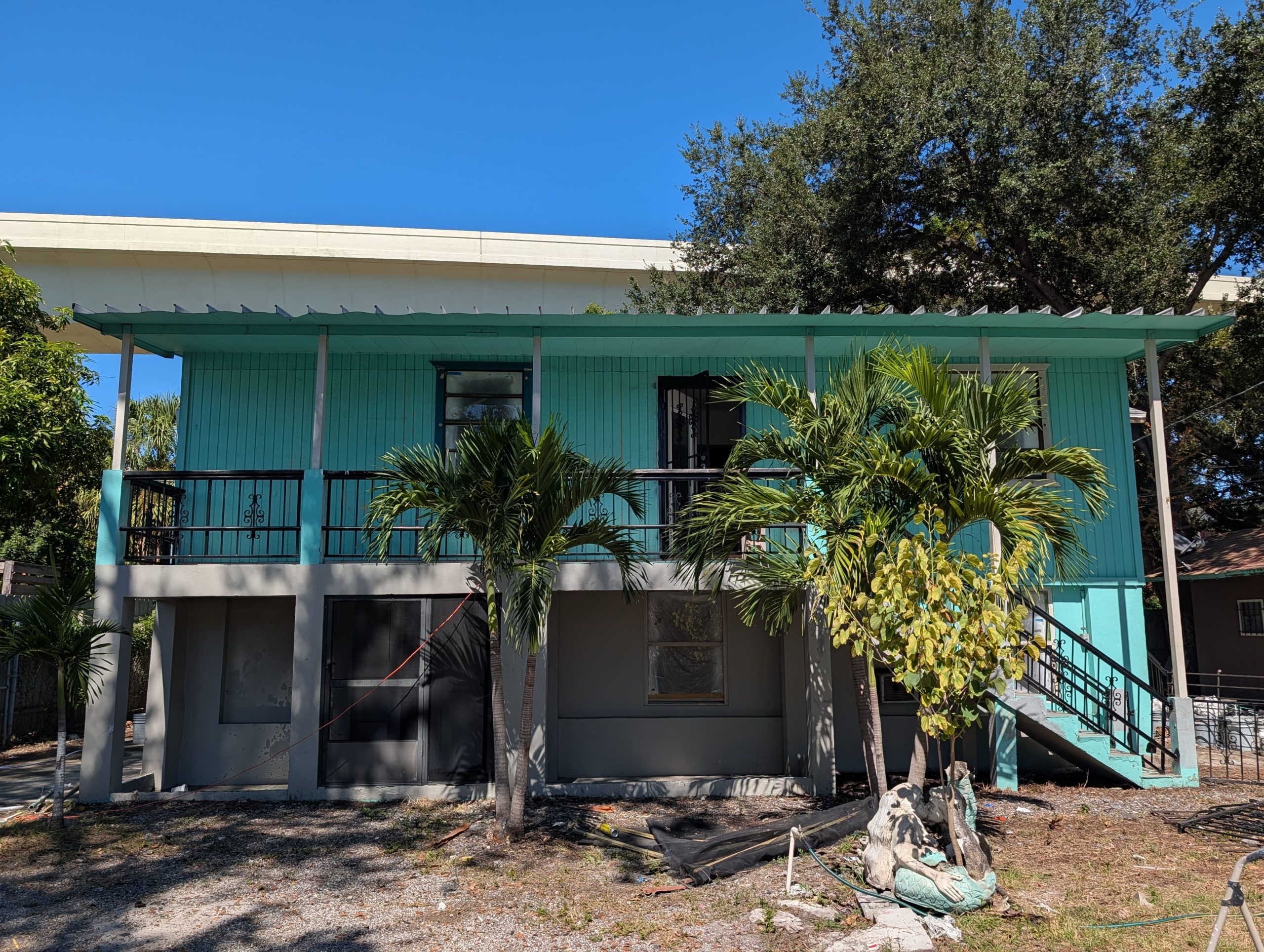 Two-Tone-Exterior-House-Painting-Teal-And-Grey