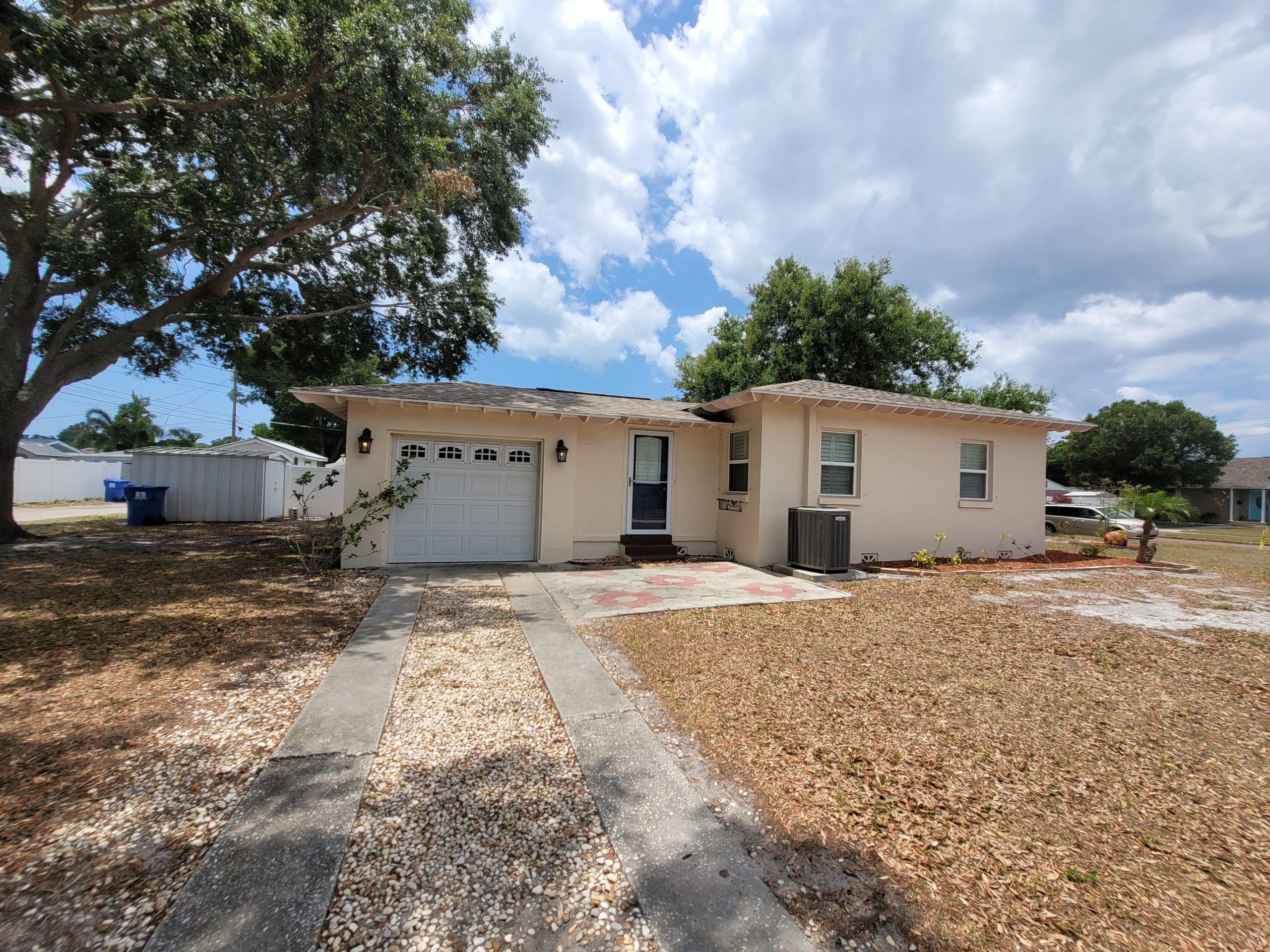 eige-Stucco-Exterior-House-Painting-White-Garage