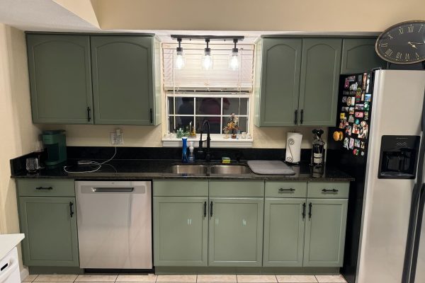 Sage-Green-Kitchen-Cabinets-Black-Countertops