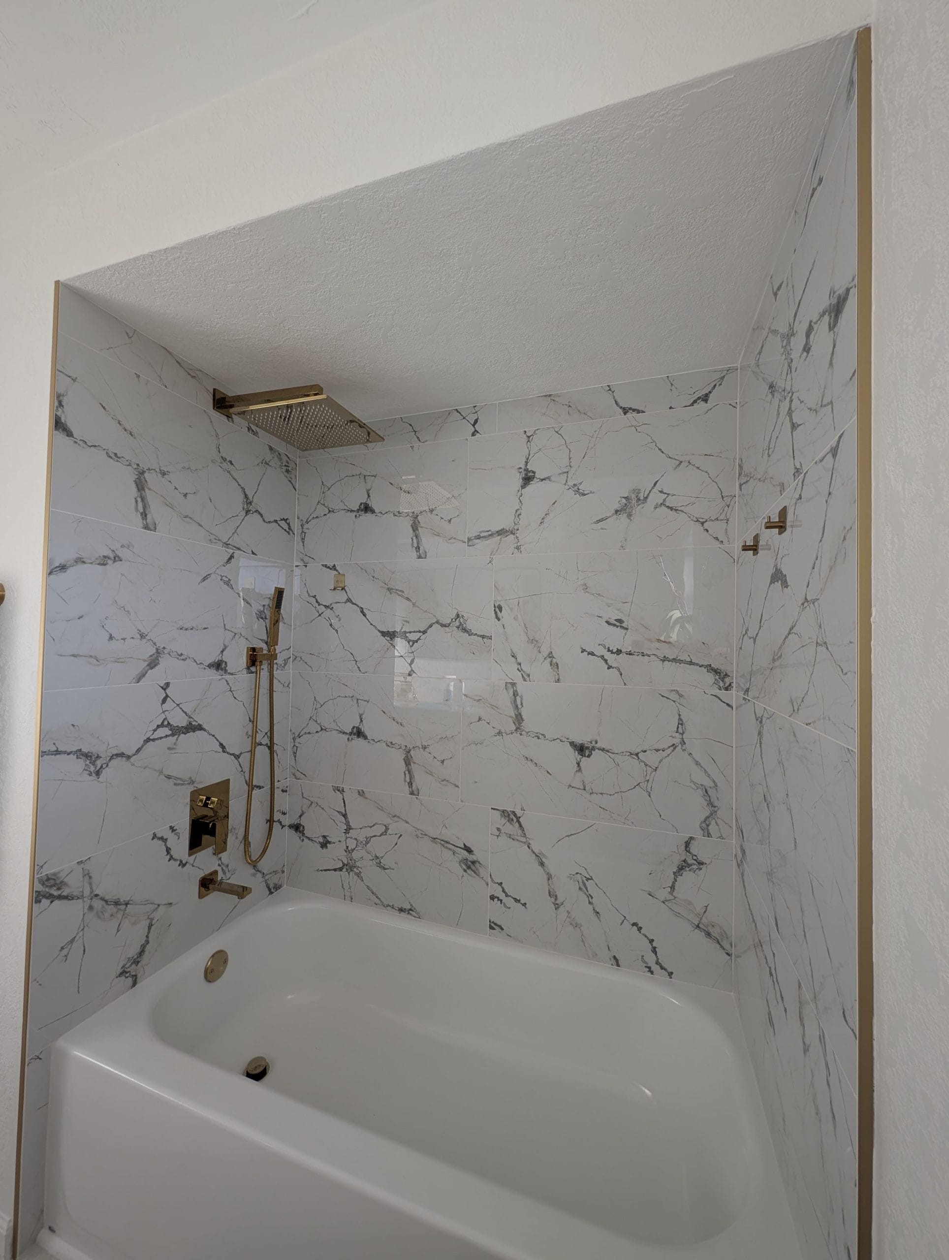 Carrara-Marble-Look-Tile-Tub-Surround