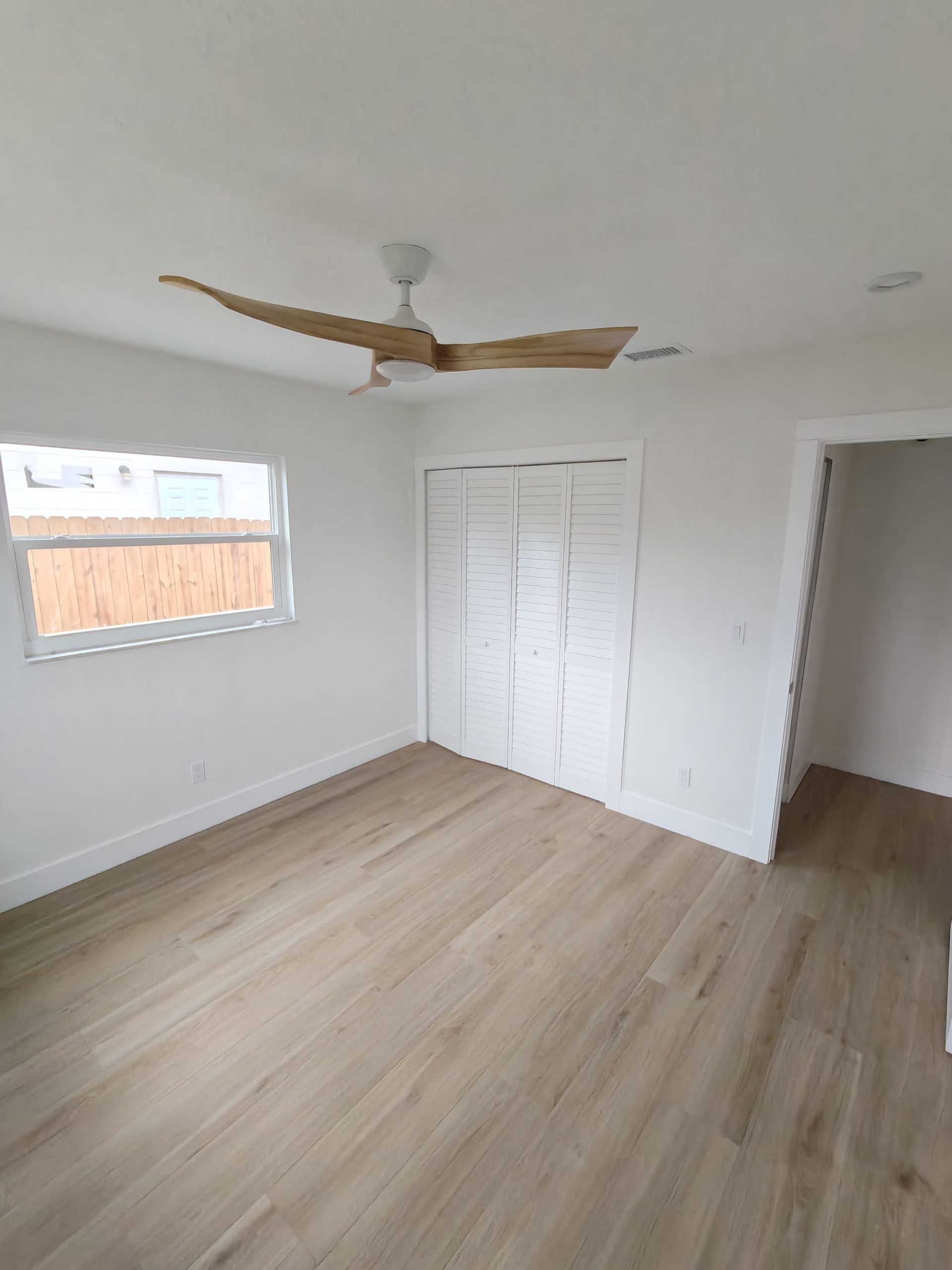 LVP-Flooring-Installation-Near-Closet-Doors