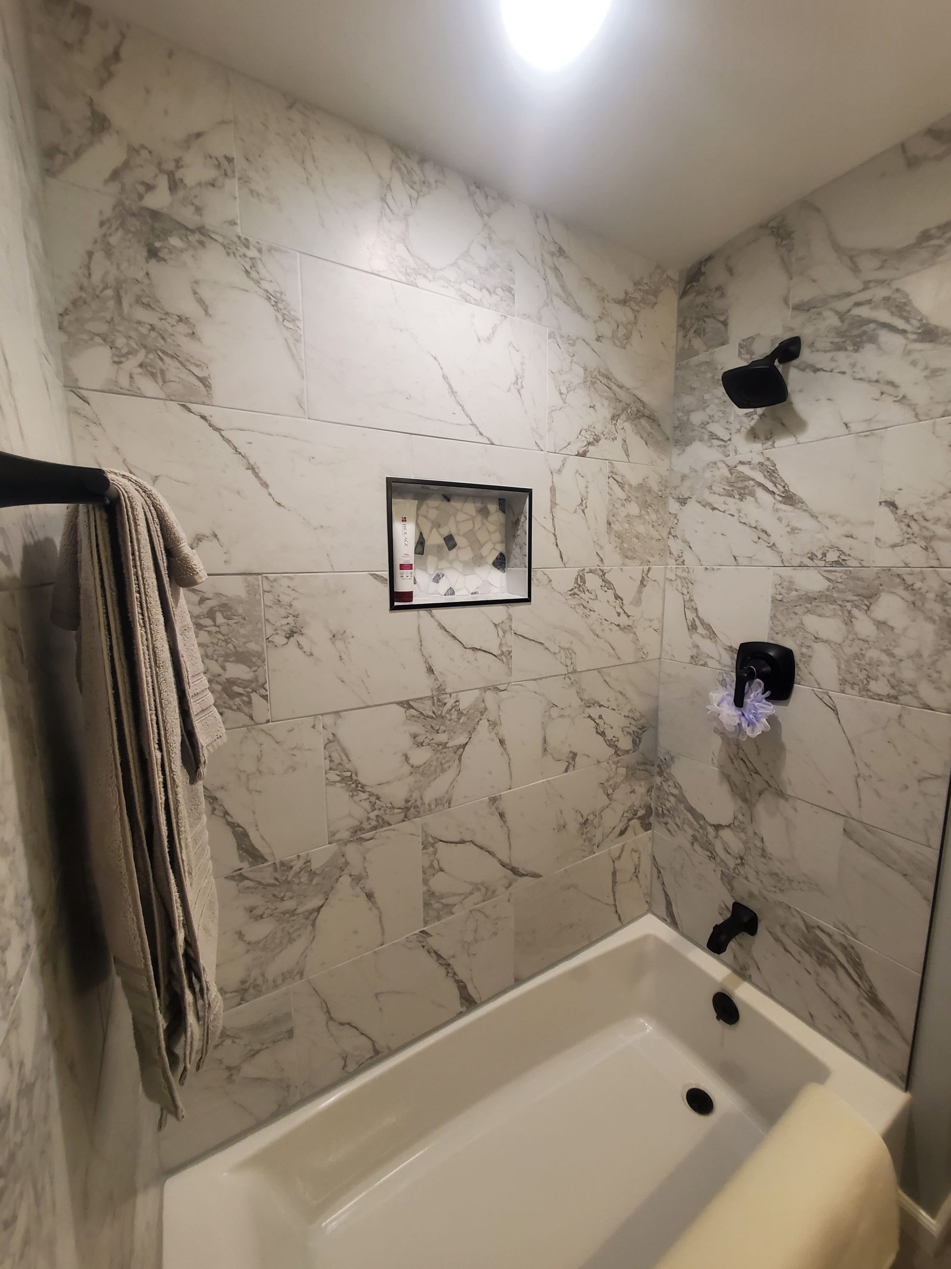 Tiled-Shower-Niche-With-Black-Trim